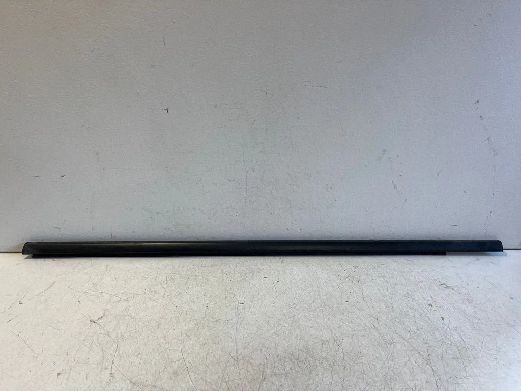 Front door glass trim molding – left