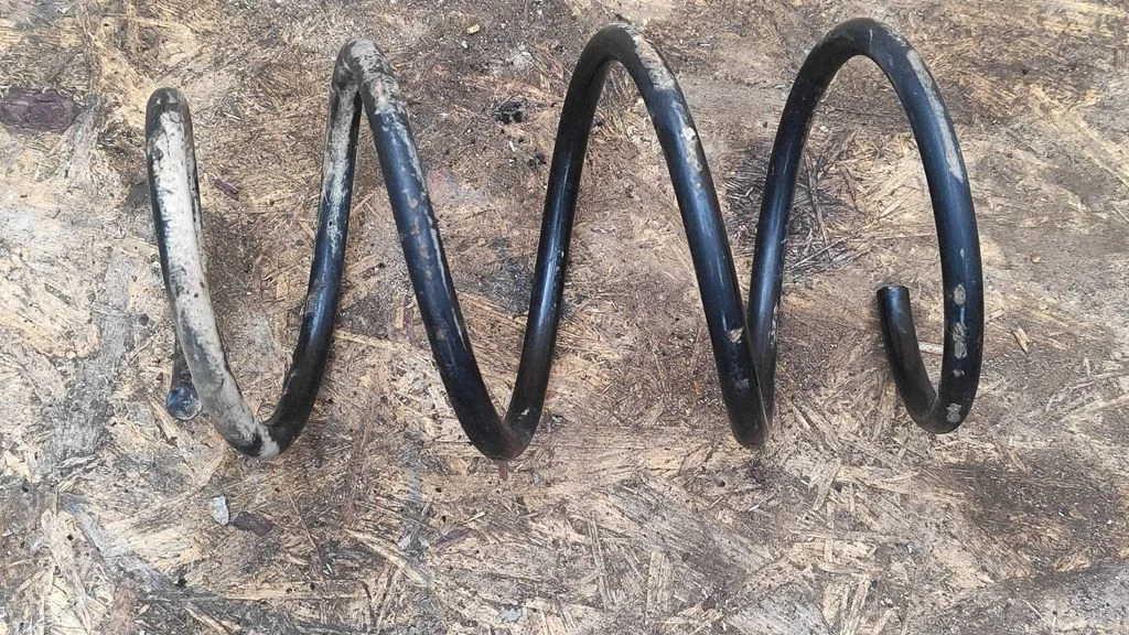 Front coil spring