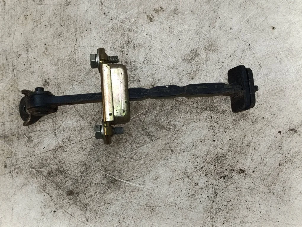 Rear door check strap stopper – Honda Civic (2006-2011)