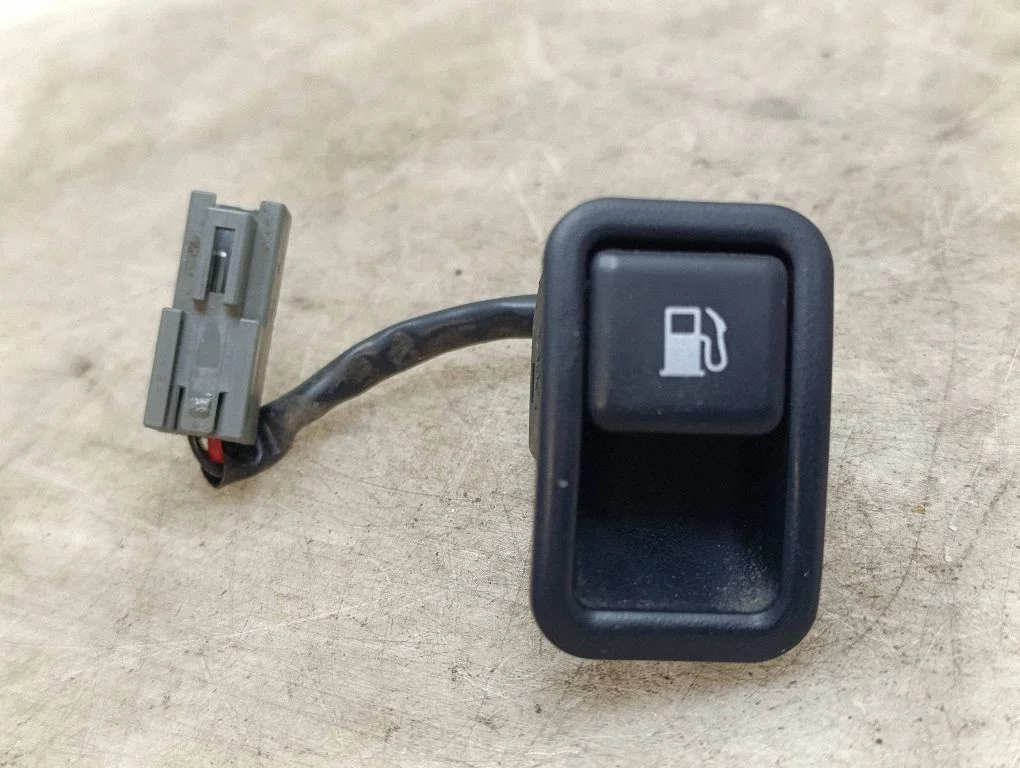 Fuel tank opening switch – Hyundai Santa Fe (2006-2012)