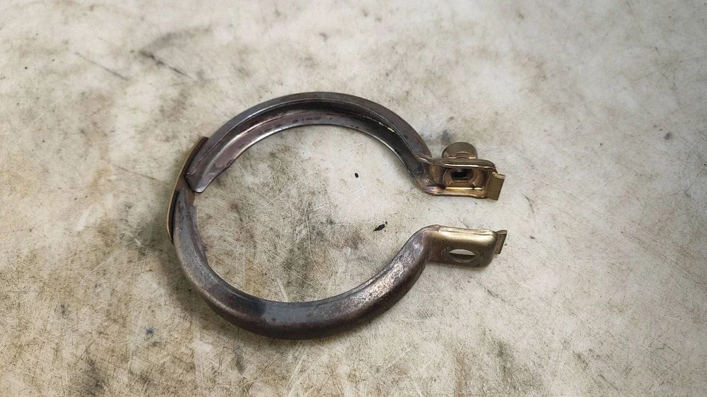 Muffler pipe connector clamp 144646RC0A