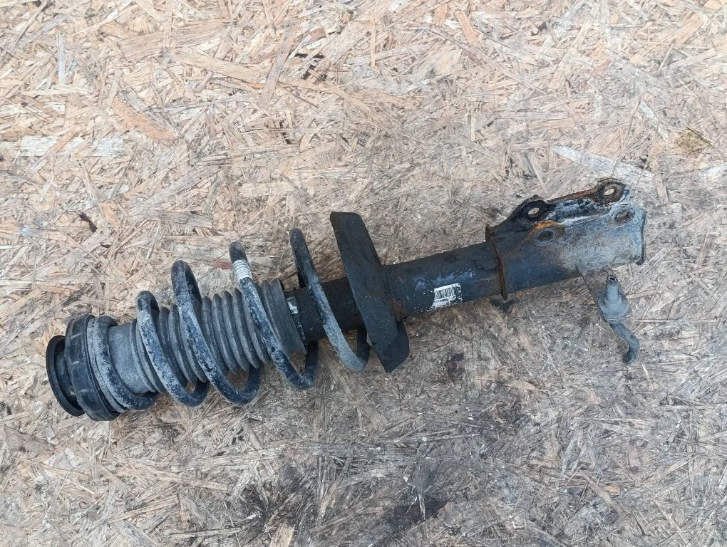 Front shock absorber with coil spring – Opel Astra J (2010-2015)