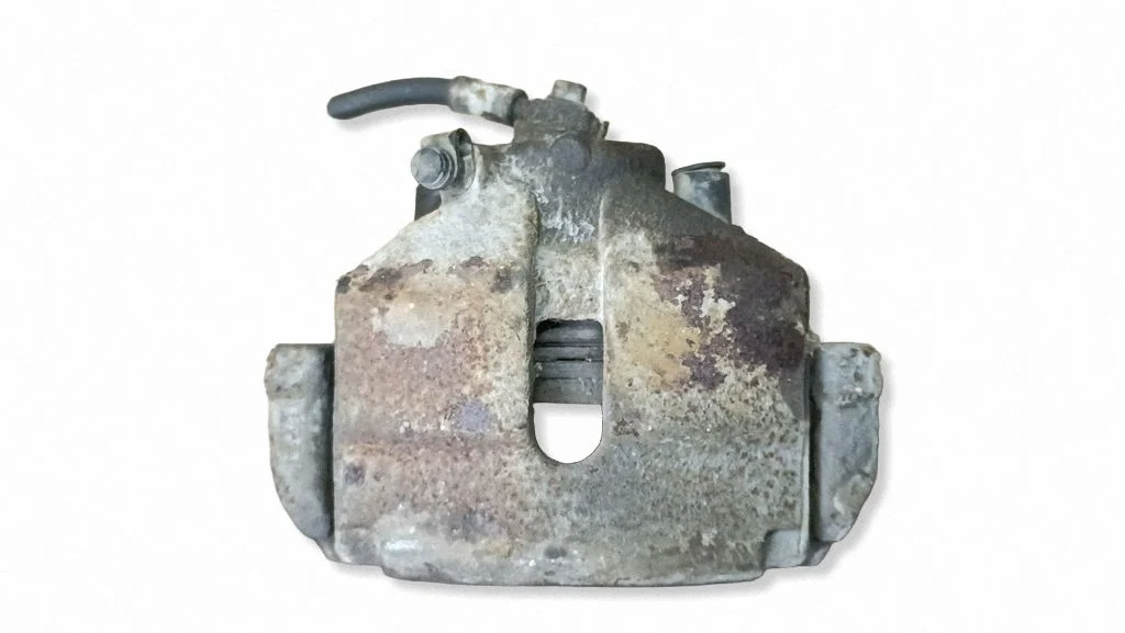 Front brake caliper – left