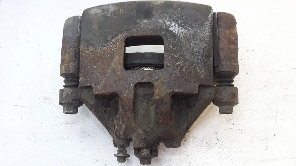 Front brake caliper – left