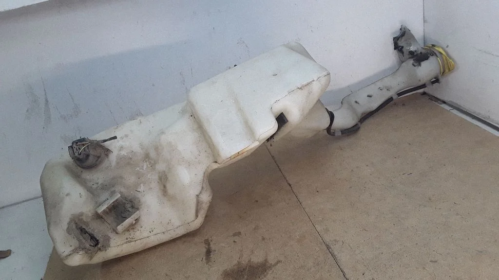 Windshield washer fluid reservoir/tank 7M3955453