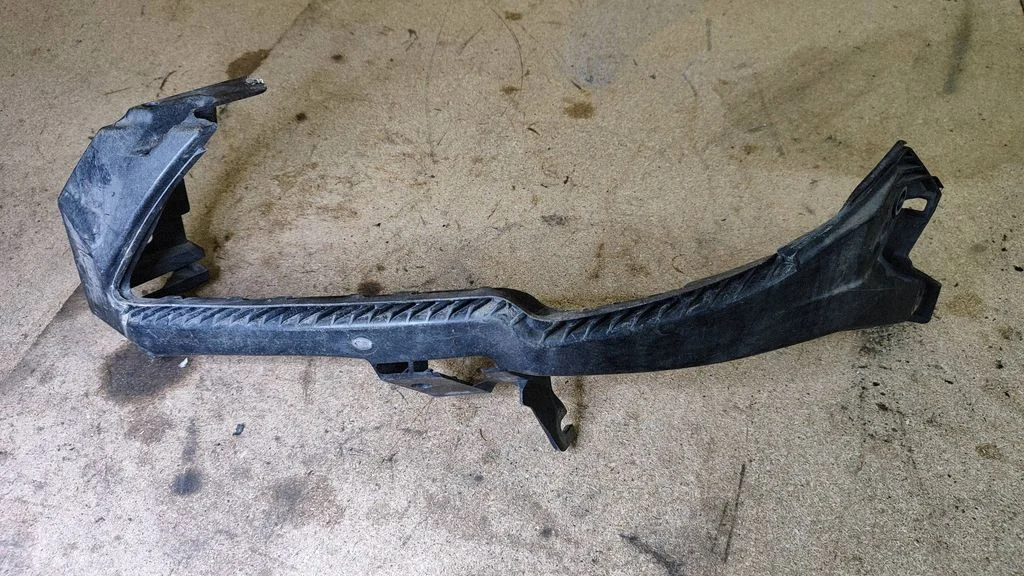 Headlight/headlamp mounting bracket – left