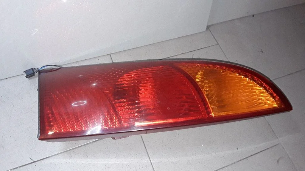 Rear/tail lights XS4X13404A