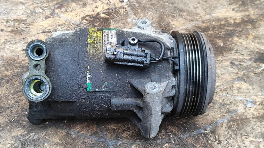 Air conditioning (A/C) compressor (pump) – Opel Astra H (2004-2012)