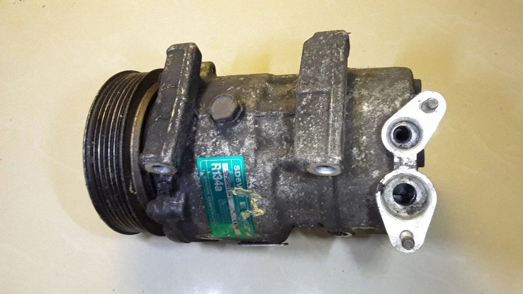 Air conditioning (A/C) compressor (pump) – Opel Astra G (1998-2009)