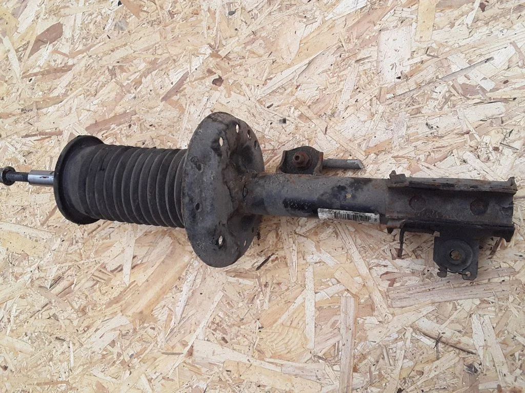 Front shock absorber/damper – left