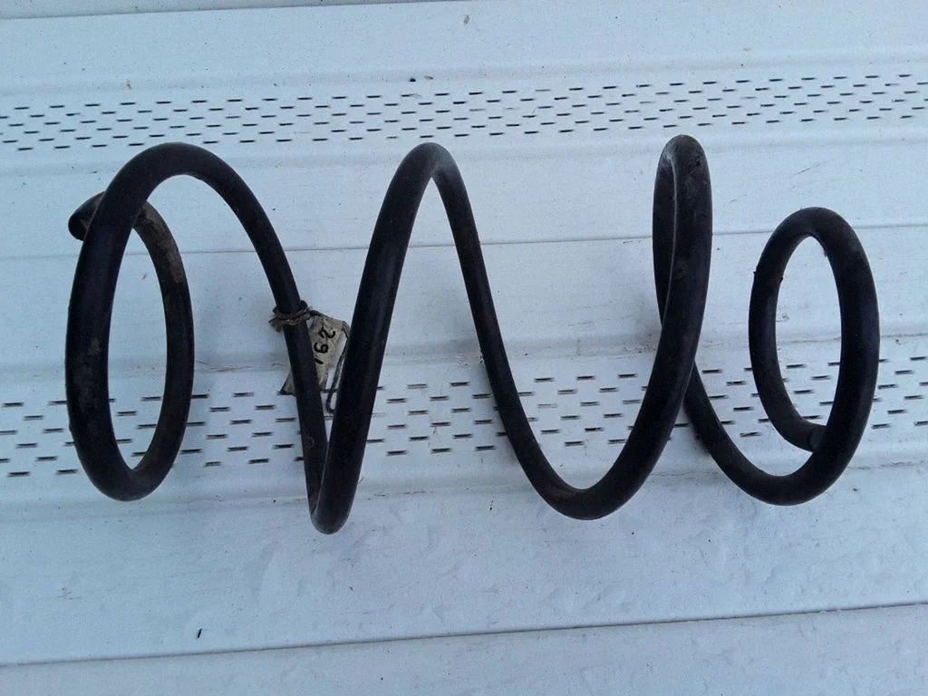 Front coil spring – Chrysler Grand Voyager IV (2001-2007)