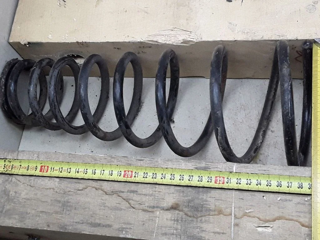 Front coil spring – Nissan Primera (1997-1999)