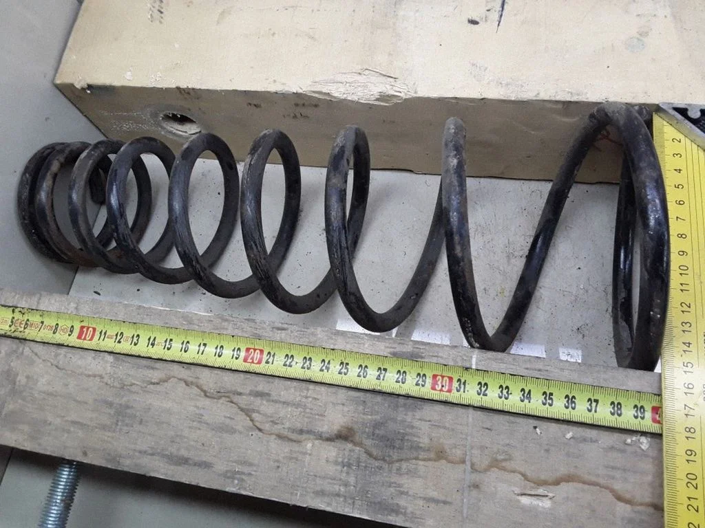 Front coil spring – Nissan Primera (1997-1999)