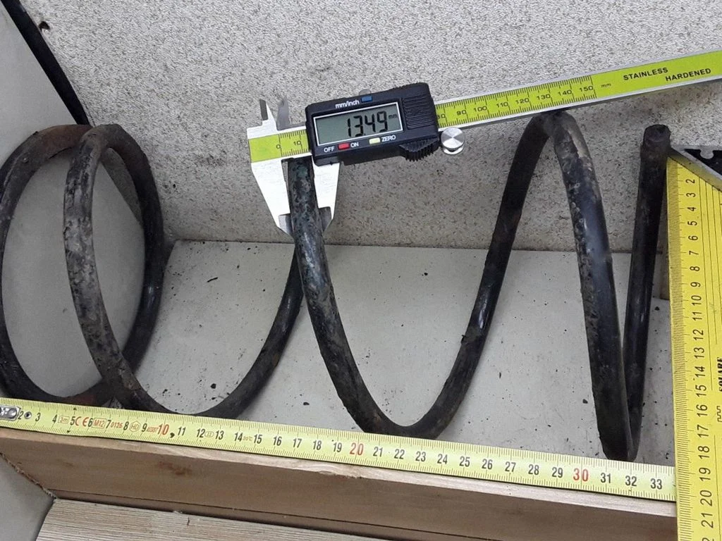 Front coil spring – Mazda 626 (1998-2002)