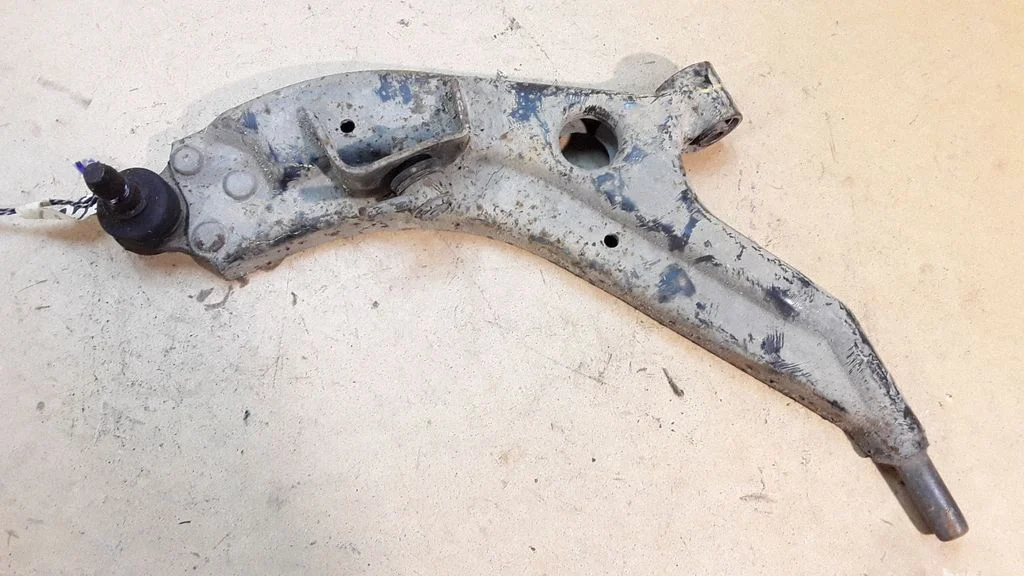 Front lower control arm/wishbone – left