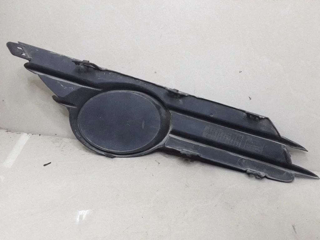 Front fog light trim/grill 13211480