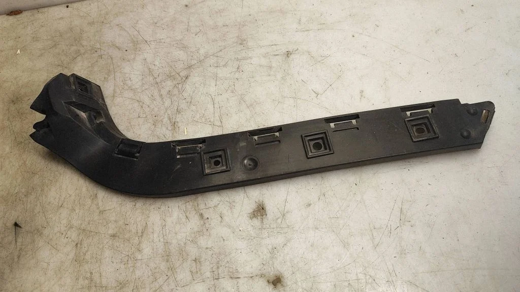 Rear bumper mounting bracket 30698694