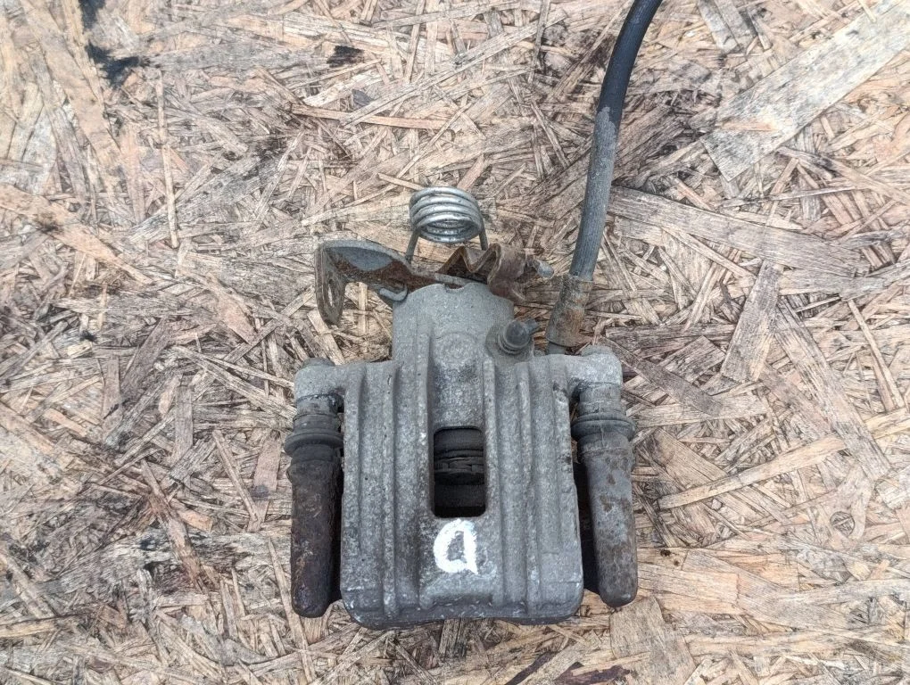 Rear brake caliper – right