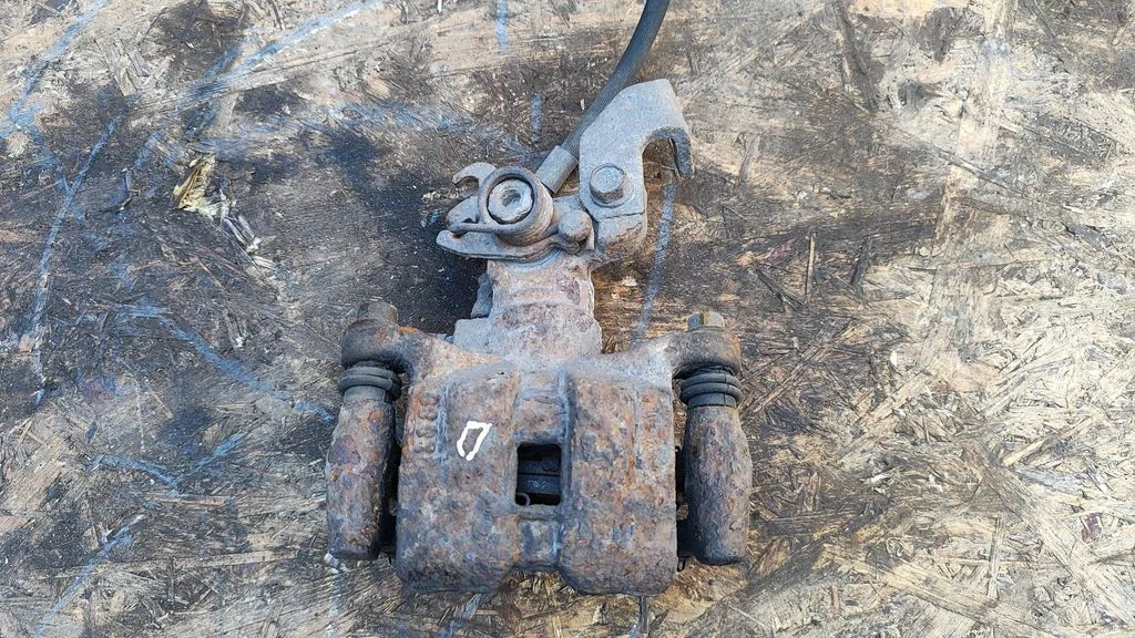 Rear brake caliper – right