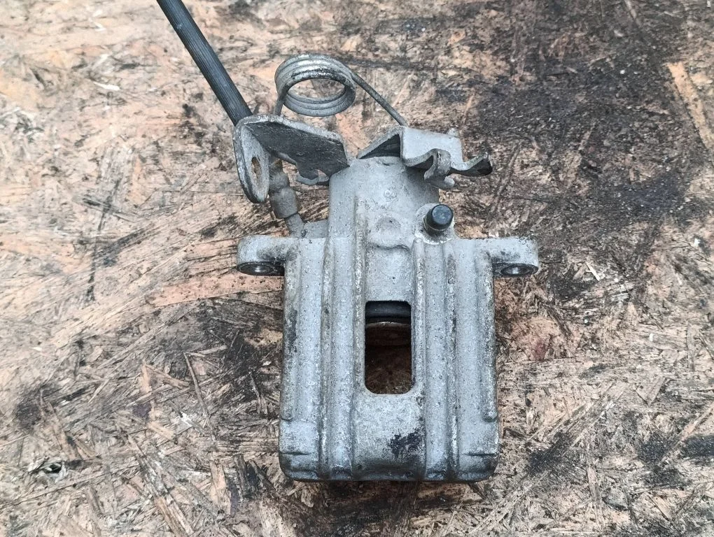 Rear brake caliper – right
