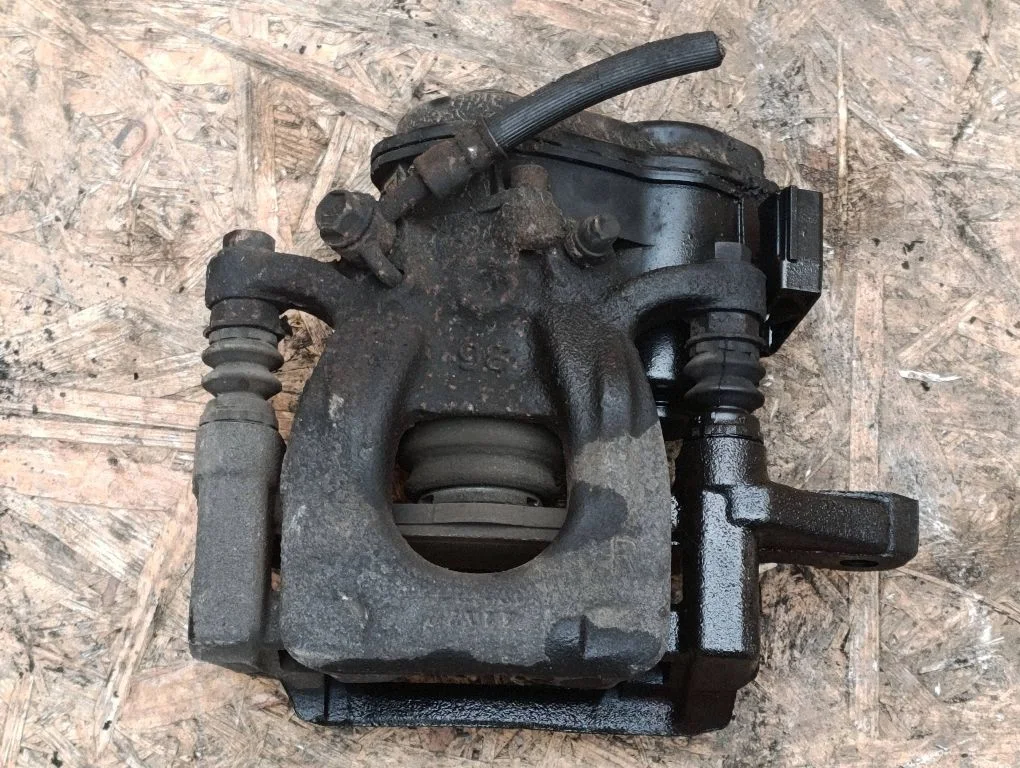 Rear brake caliper – right