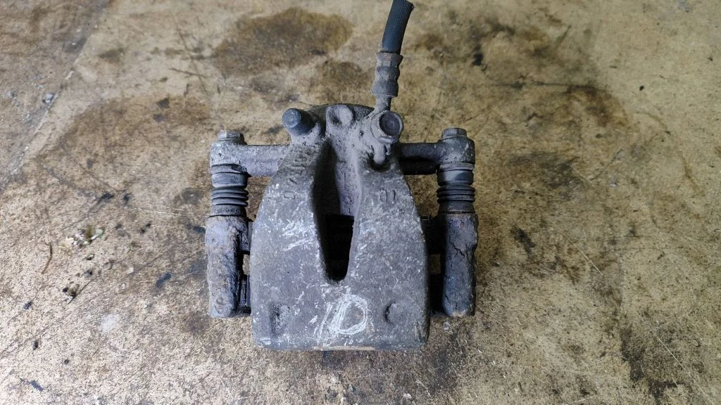 Rear brake caliper – right