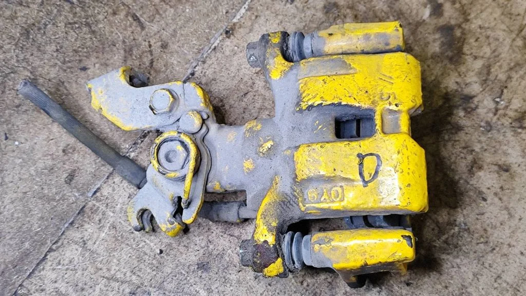 Rear brake caliper – right