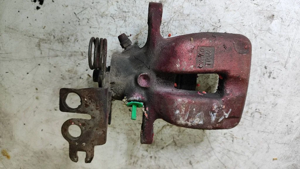 Rear brake caliper – right