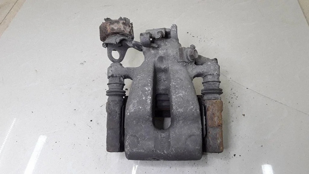 Rear brake caliper – right