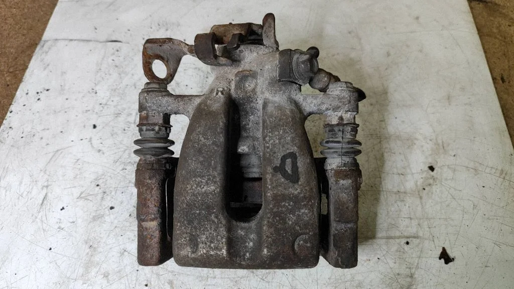 Rear brake caliper – right