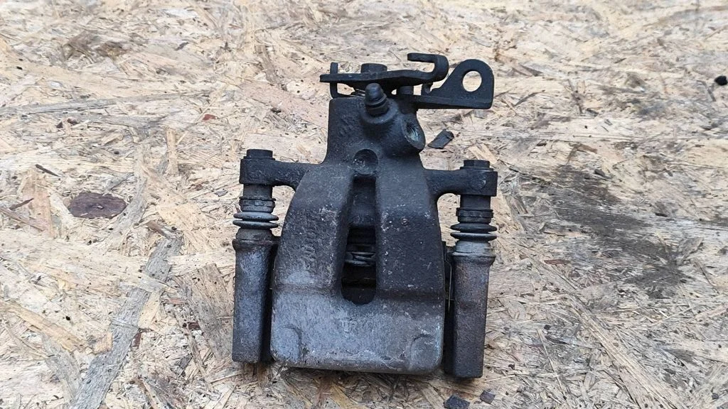 Rear brake caliper – right
