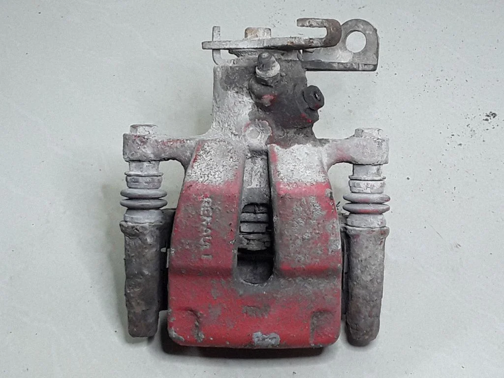 Rear brake caliper – right