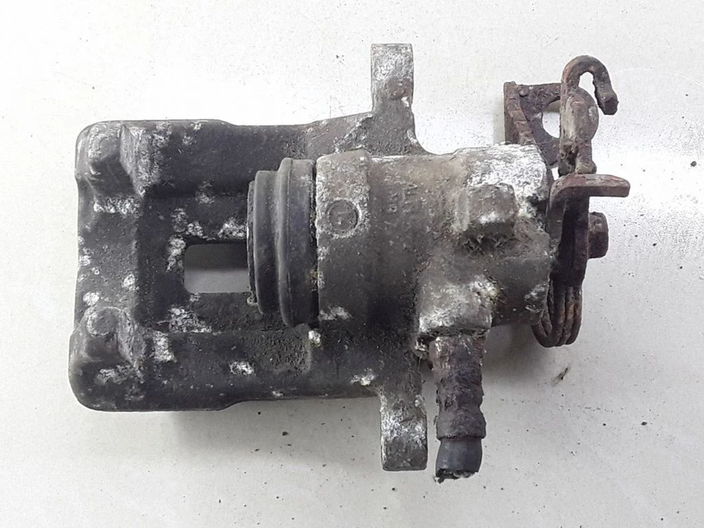 Rear brake caliper – right