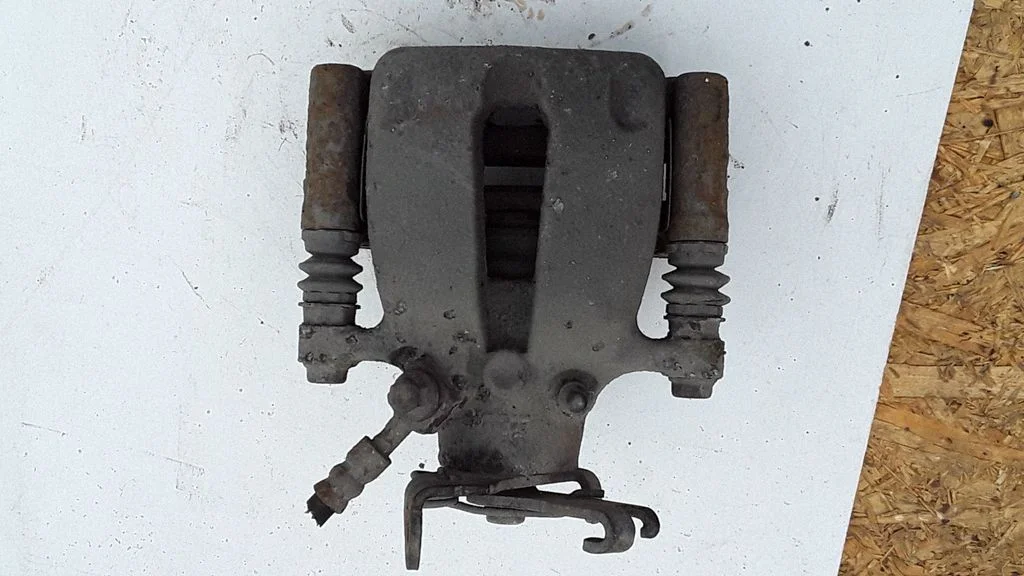 Rear brake caliper – right
