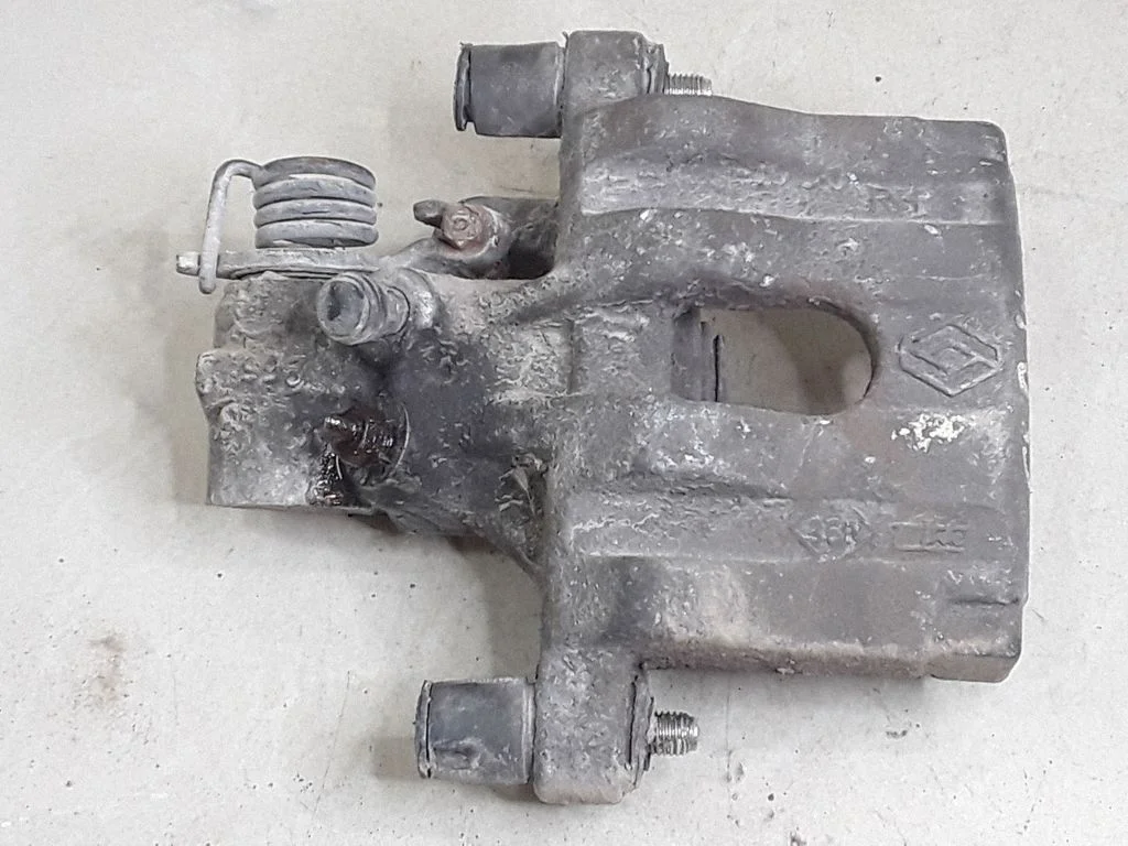 Rear brake caliper – right