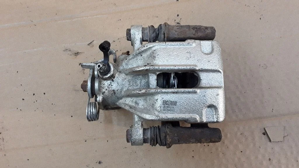 Rear brake caliper 07762012