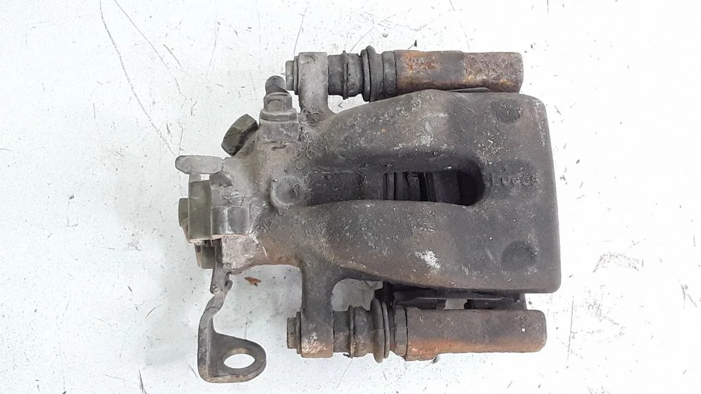 Rear brake caliper – right