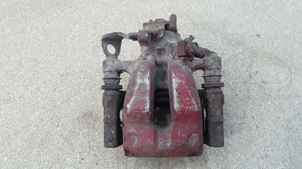 Rear brake caliper – right
