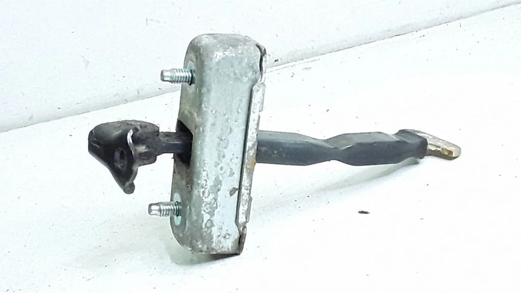 Rear door check strap stopper – Toyota Matrix (E130) (2001-2008)