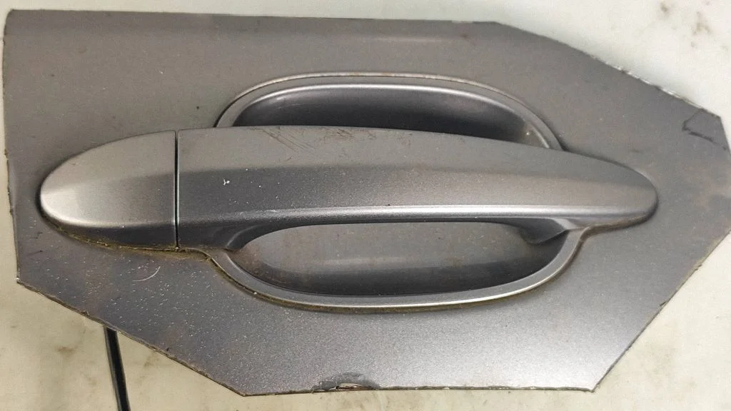 Tagaukse välimine käepide 7034544