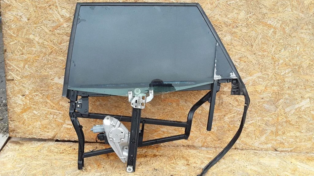 Rear door window regulator with motor 4B0839397B