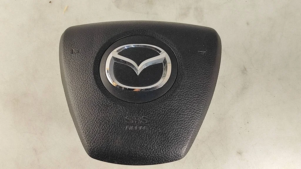 Steering wheel airbag T93402A