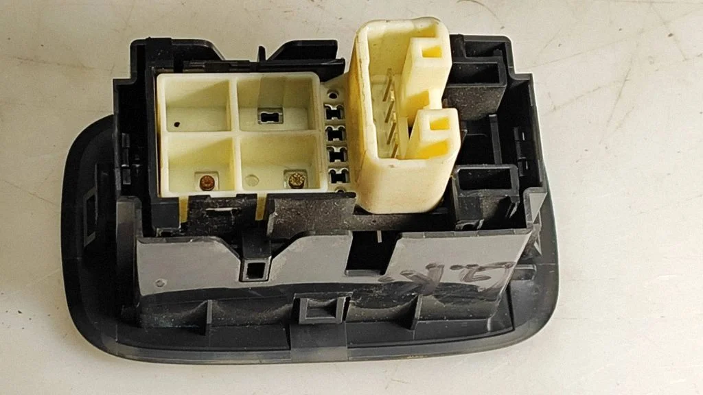 Electric window control switch – rear
