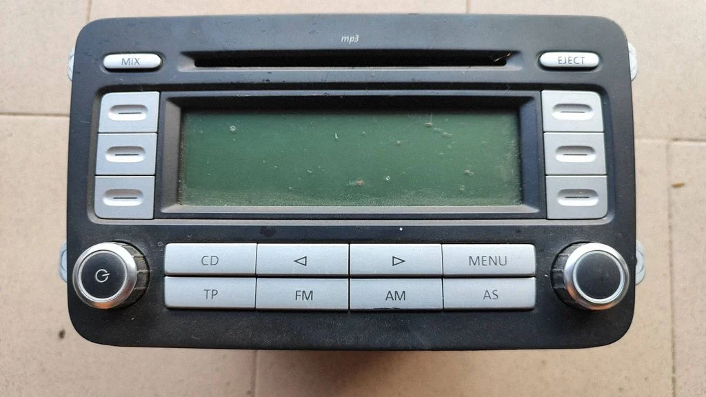 Radio, odtwarzacz CD/DVD, nawigacja 1K0035186AD