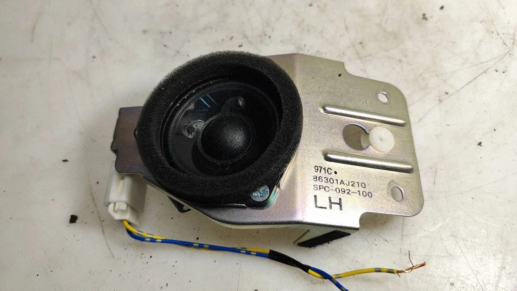 Głośnik w drzwiach przednich 86301AJ210