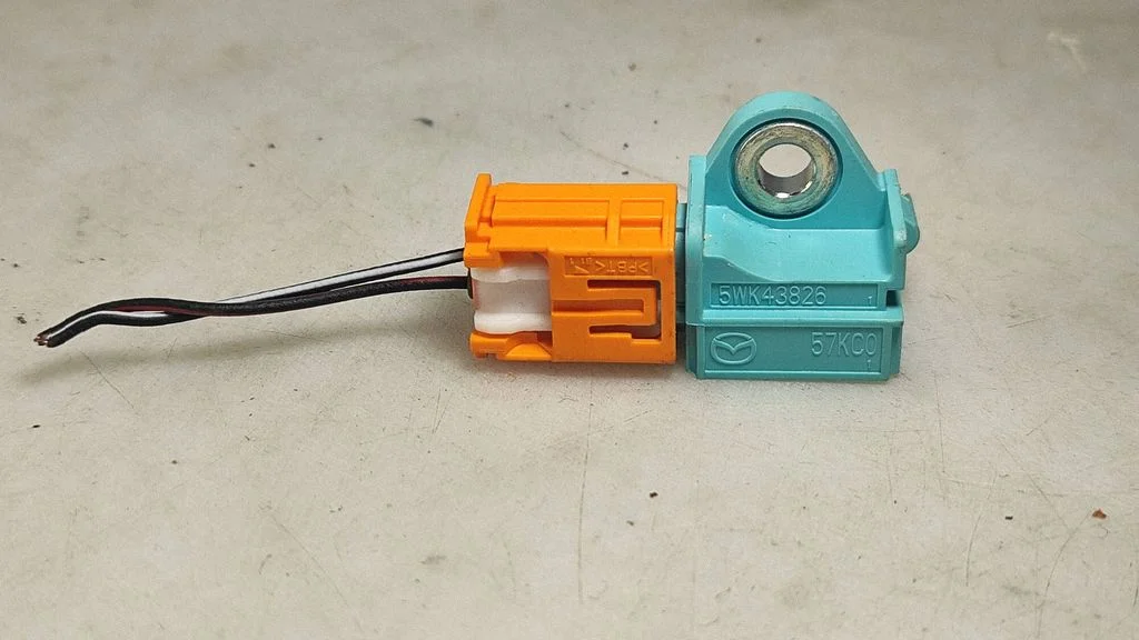 Airbag deployment crash/impact sensor 5WK43826
