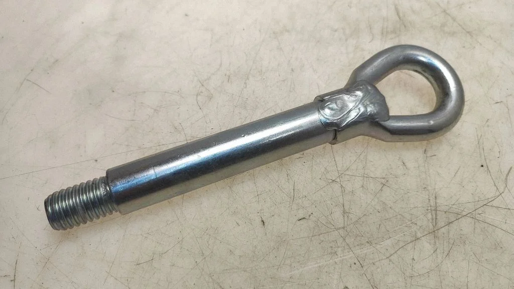 Towing hook eye