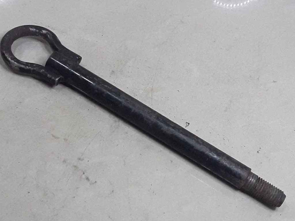 Towing hook eye