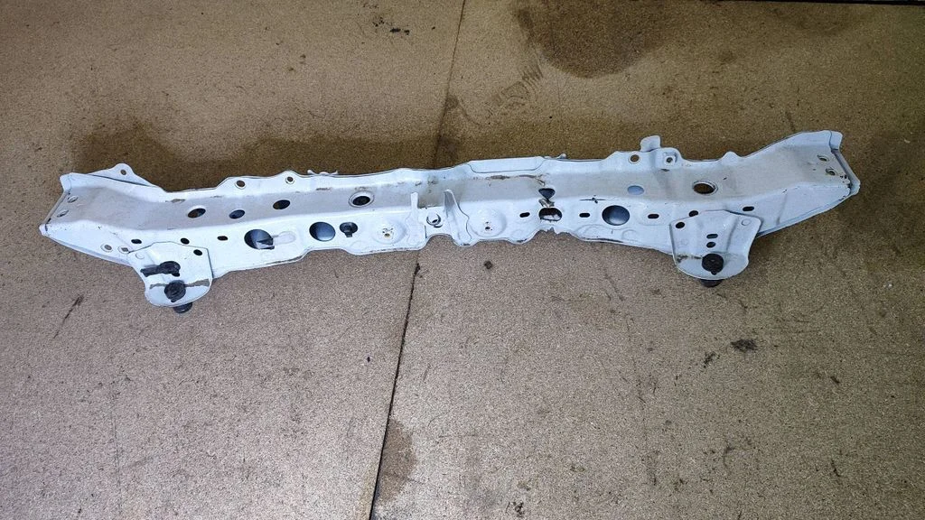 Top upper radiator support slam panel