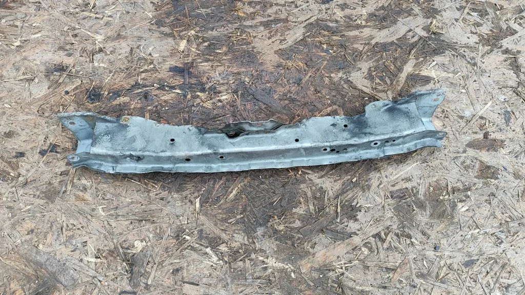 Top upper radiator support slam panel